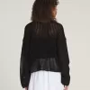 Mila – Kurzer Rundhalspullover mit offenem Strickmuster
